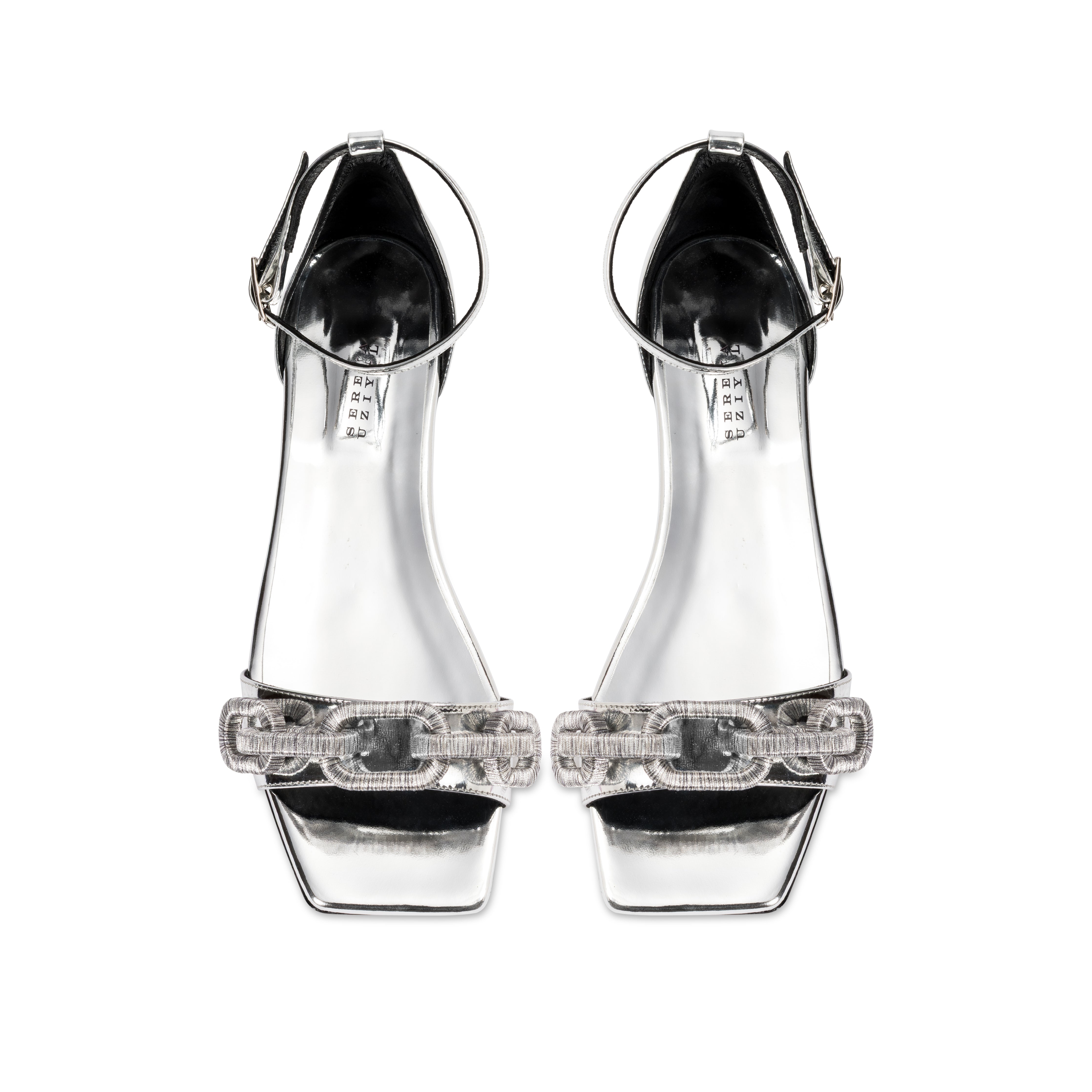 Catena Mirror Flat Ankle Sandal featuring clear straps and a chic design, perfect for stylish summer outings.