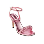 Kibele Metallic Pink Ankle Cross Sandal featuring a slender stiletto heel and intricate embroidery, perfect for evening wear.