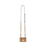 Alessa Cappuccino Card Holder with a decorative detachable strap featuring embroidered balls and signature metallic details.