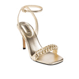 Kibele Sahara Ankle Cross Sandal in shimmering metallic leather featuring a dainty ankle strap and intricate embroidery.