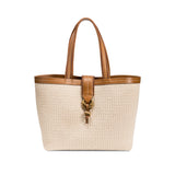 Boho chic medium off white tote bag with a stylish brown handle and decorative clasp on a white background.