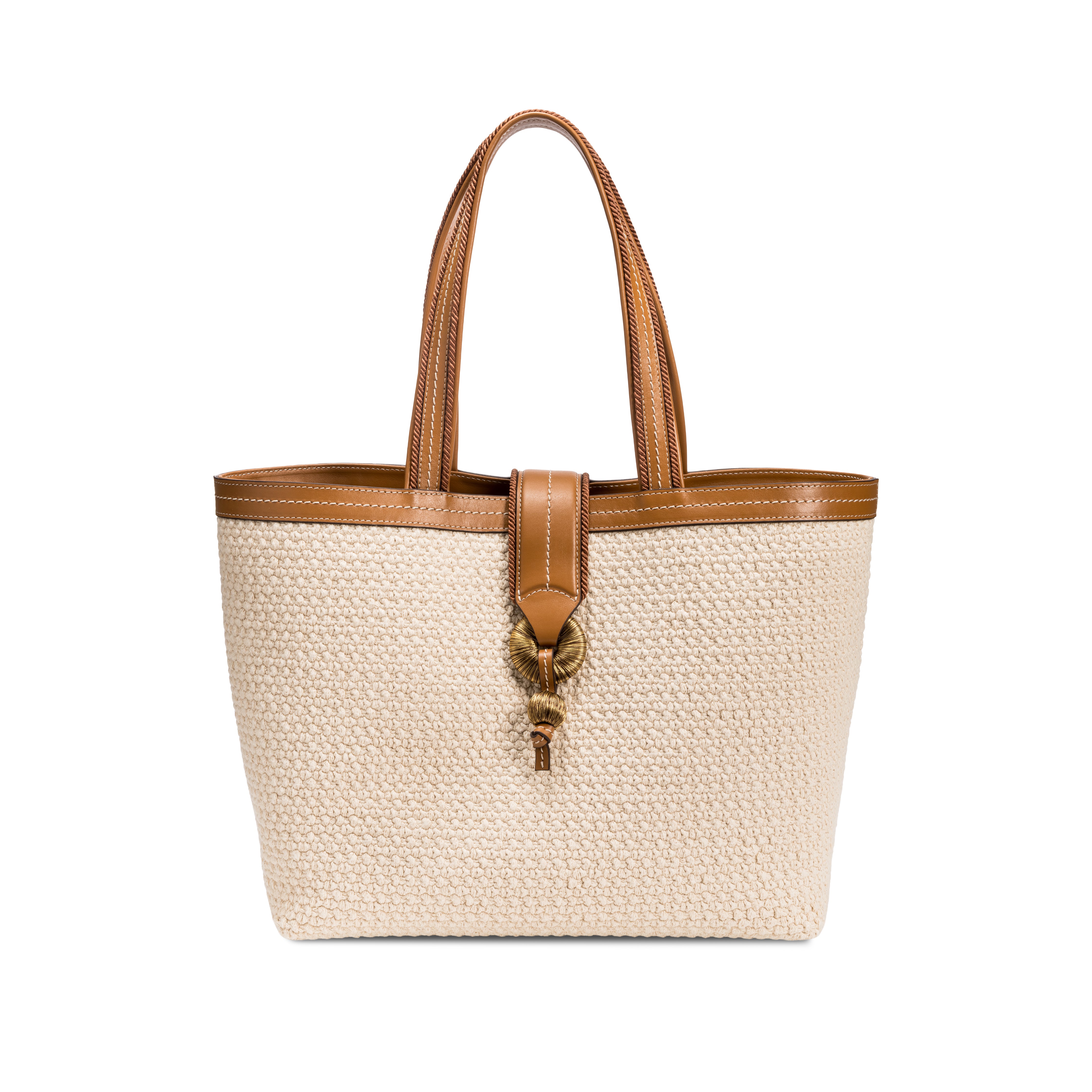 Boho chic medium off white tote bag with a stylish brown handle and decorative clasp on a white background.