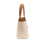 Side view of a boho chic medium off-white tote bag with brown leather straps, perfect for stylish everyday use.