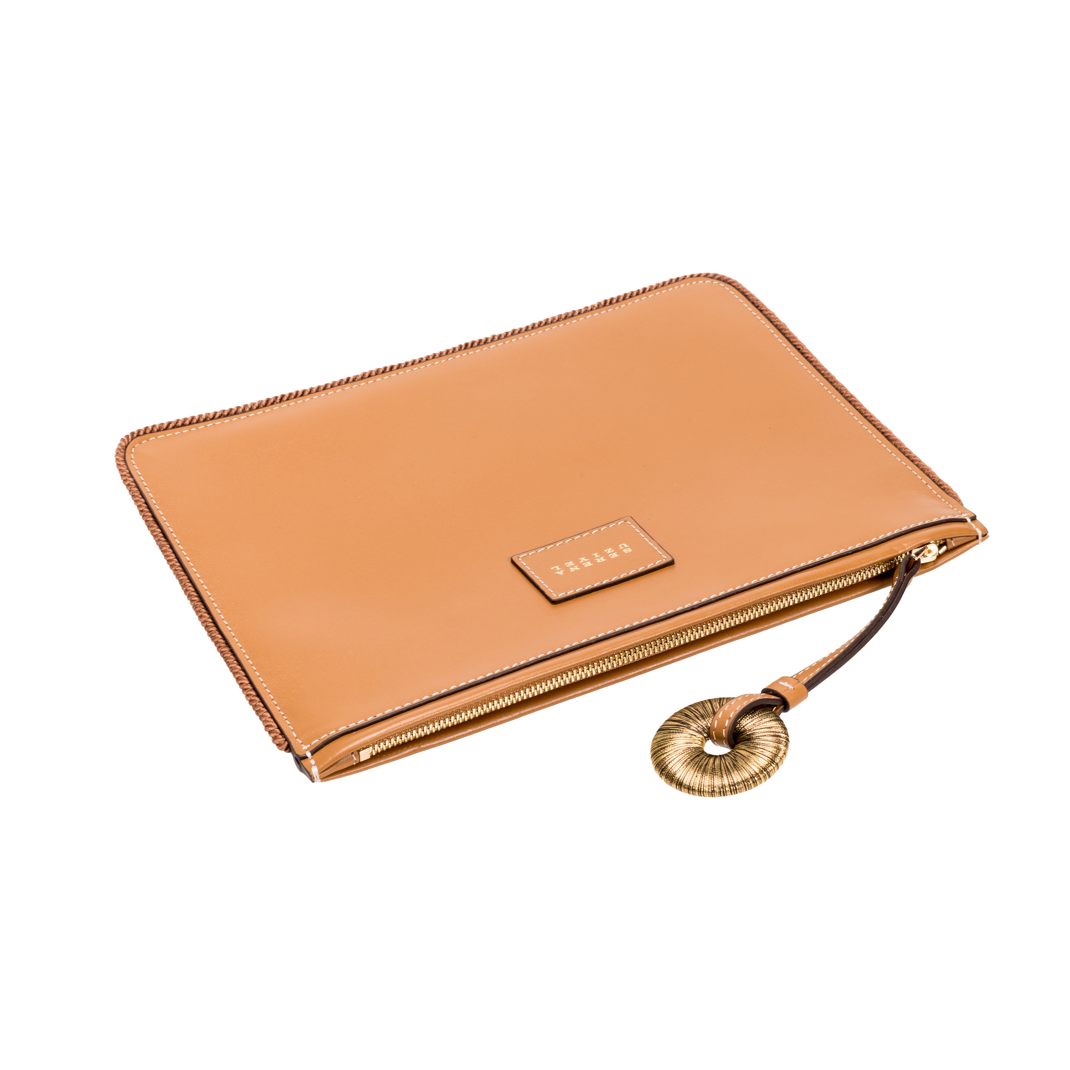 Stylish tan leather clutch with zipper and decorative handle, ideal for organizing essentials and adding a chic touch.