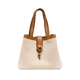Boho chic medium off white tote bag with brown straps and decorative knot detail, perfect for casual outings.