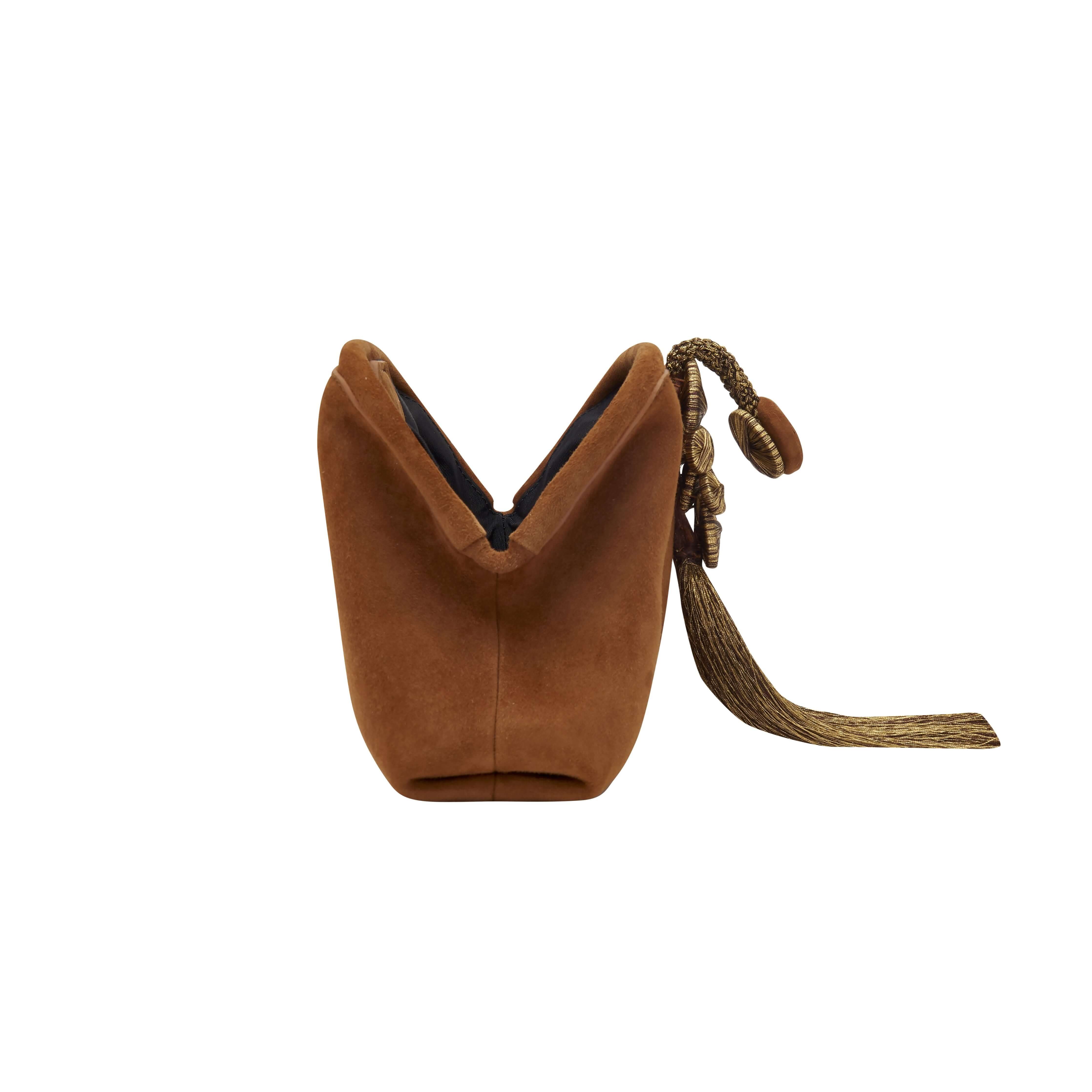 Alessa Camello Pouch Bag in rich camello suede with elegant knotted design and thread-wrapped fastening.