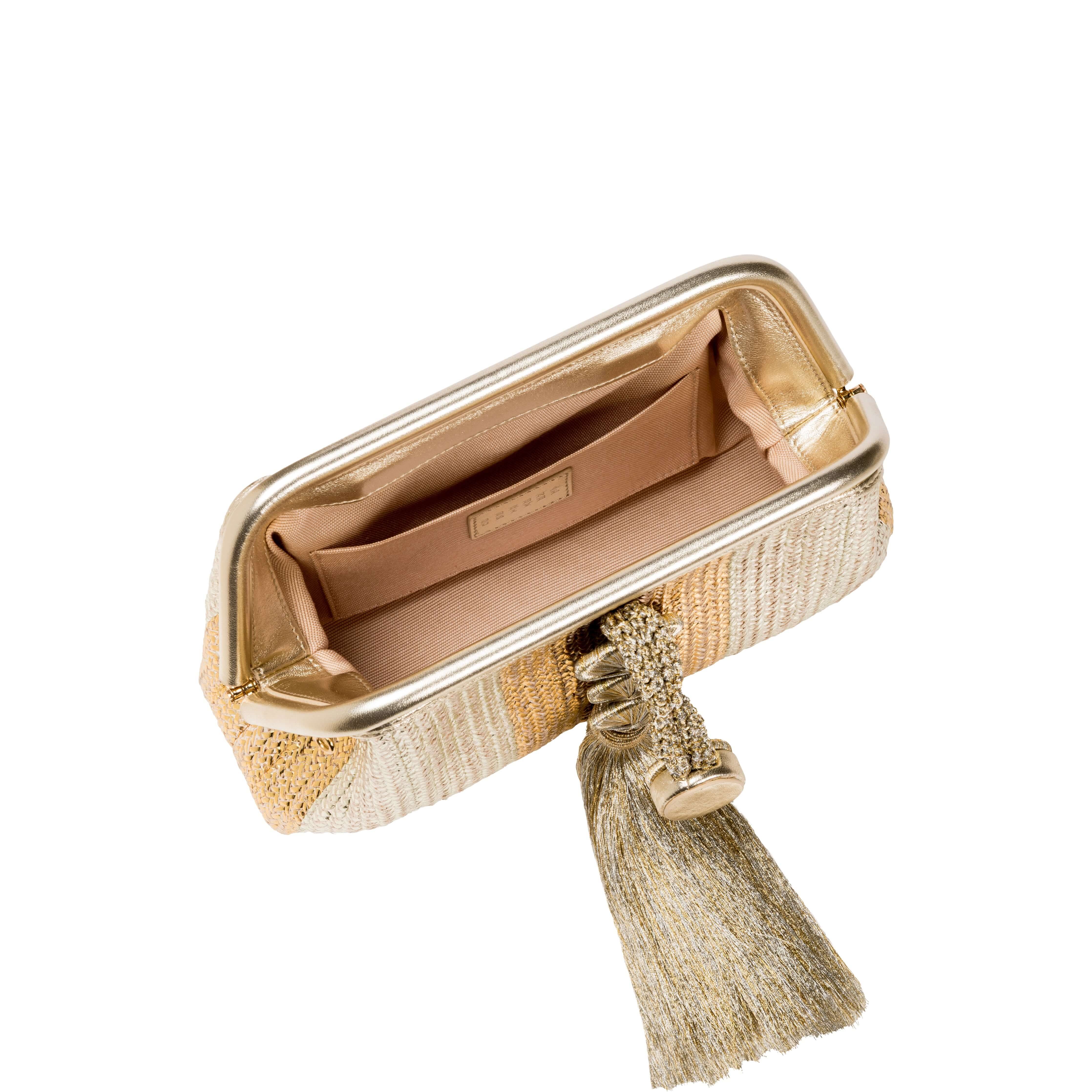 Interior view of Alessa Gold Silver Pouch Bag showcasing its elegant design and spacious compartment.