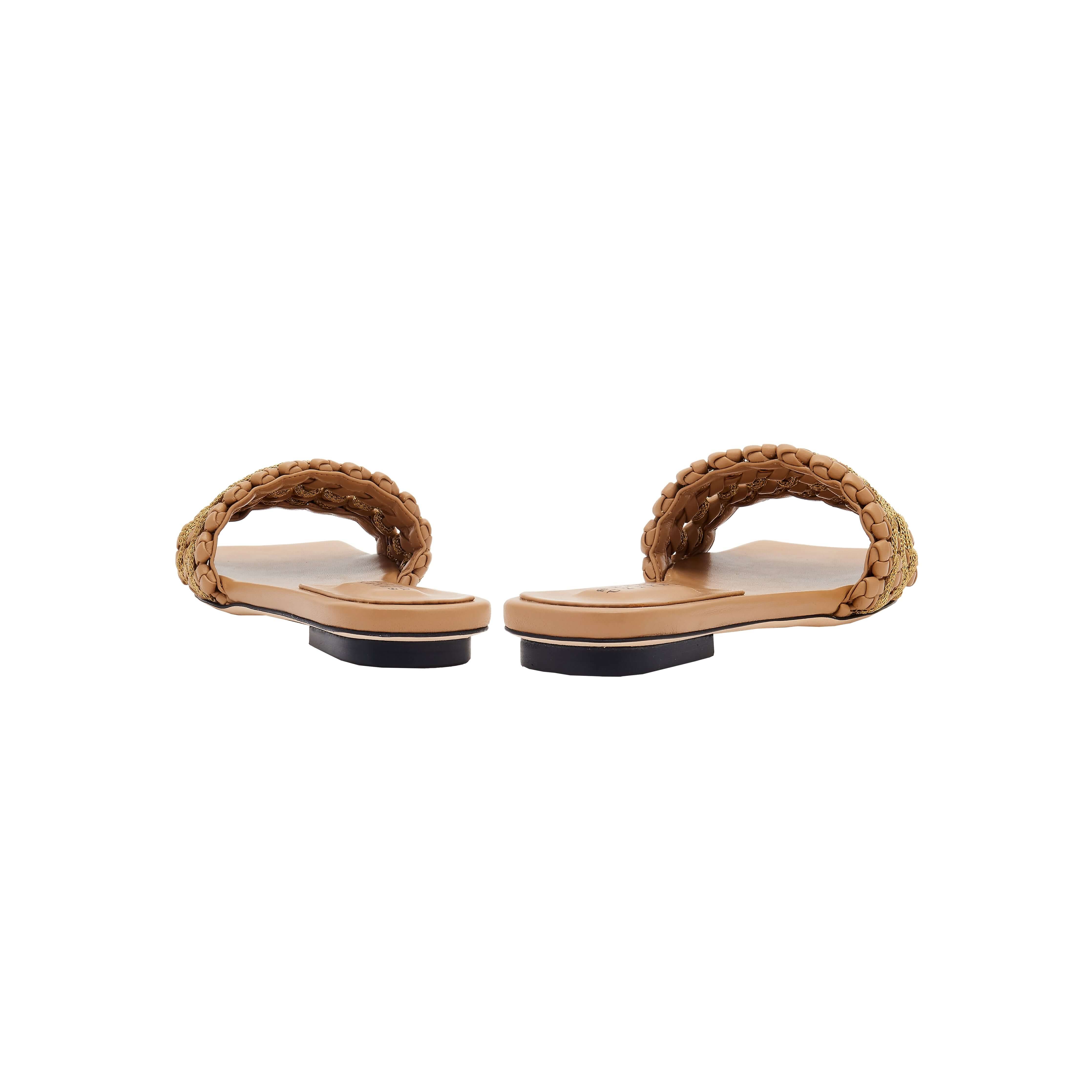 Aurnia Latte Flat Sandal featuring a stylish braided design and comfortable flat sole, perfect for summer outings.