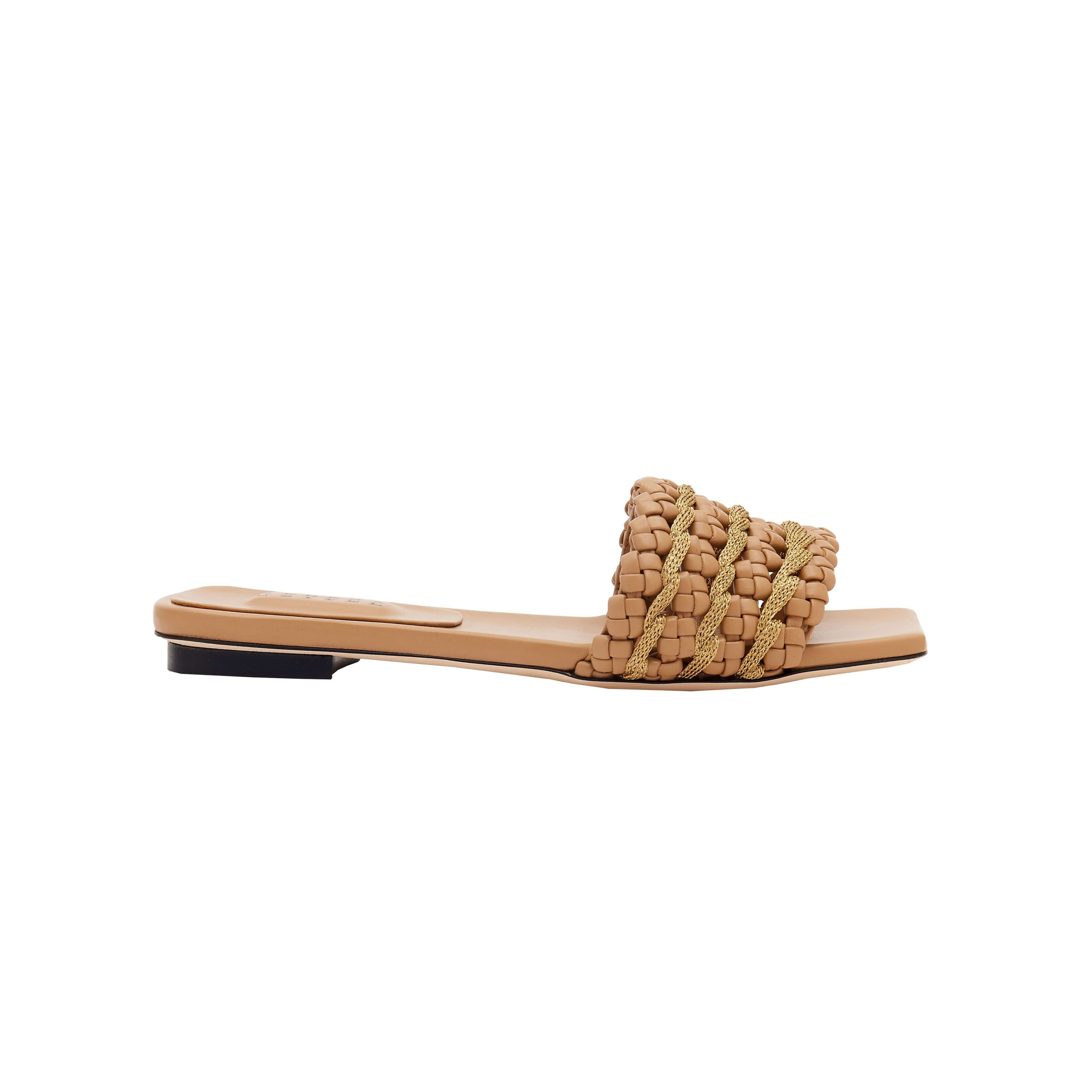 Aurnia Latte Flat Sandal featuring stylish braided design and comfortable slip-on style for casual wear.