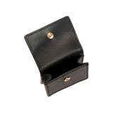 Open black leather wallet with gold snap closure, featuring sleek design and spacious compartments.