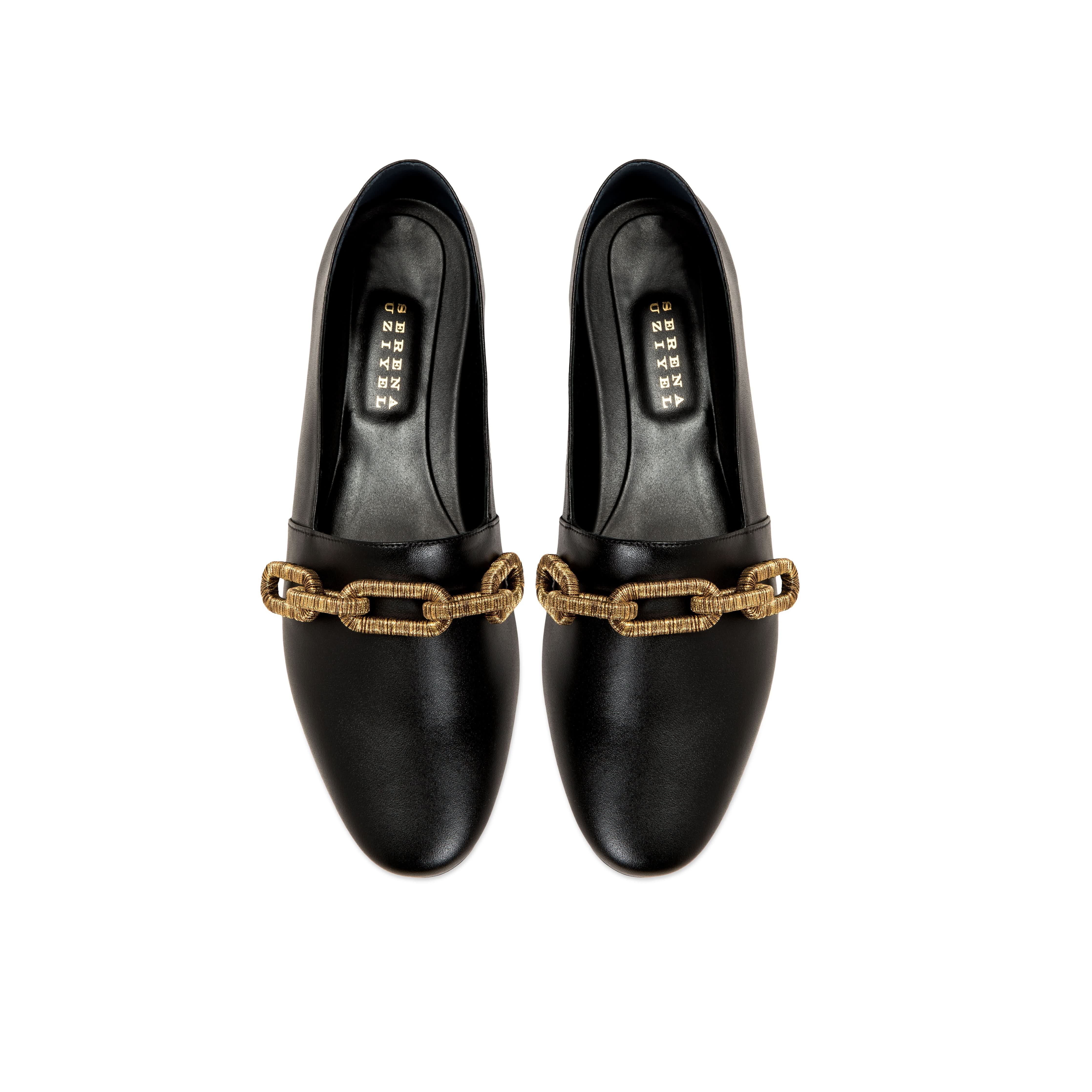 Catena black leather flat loafer with gold chain accent, perfect for stylish and comfortable everyday wear.