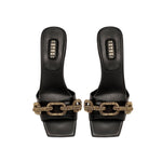 Catena Black Mid-Heel Sandal featuring a gold chain link design, elegantly crafted from Italian leather.
