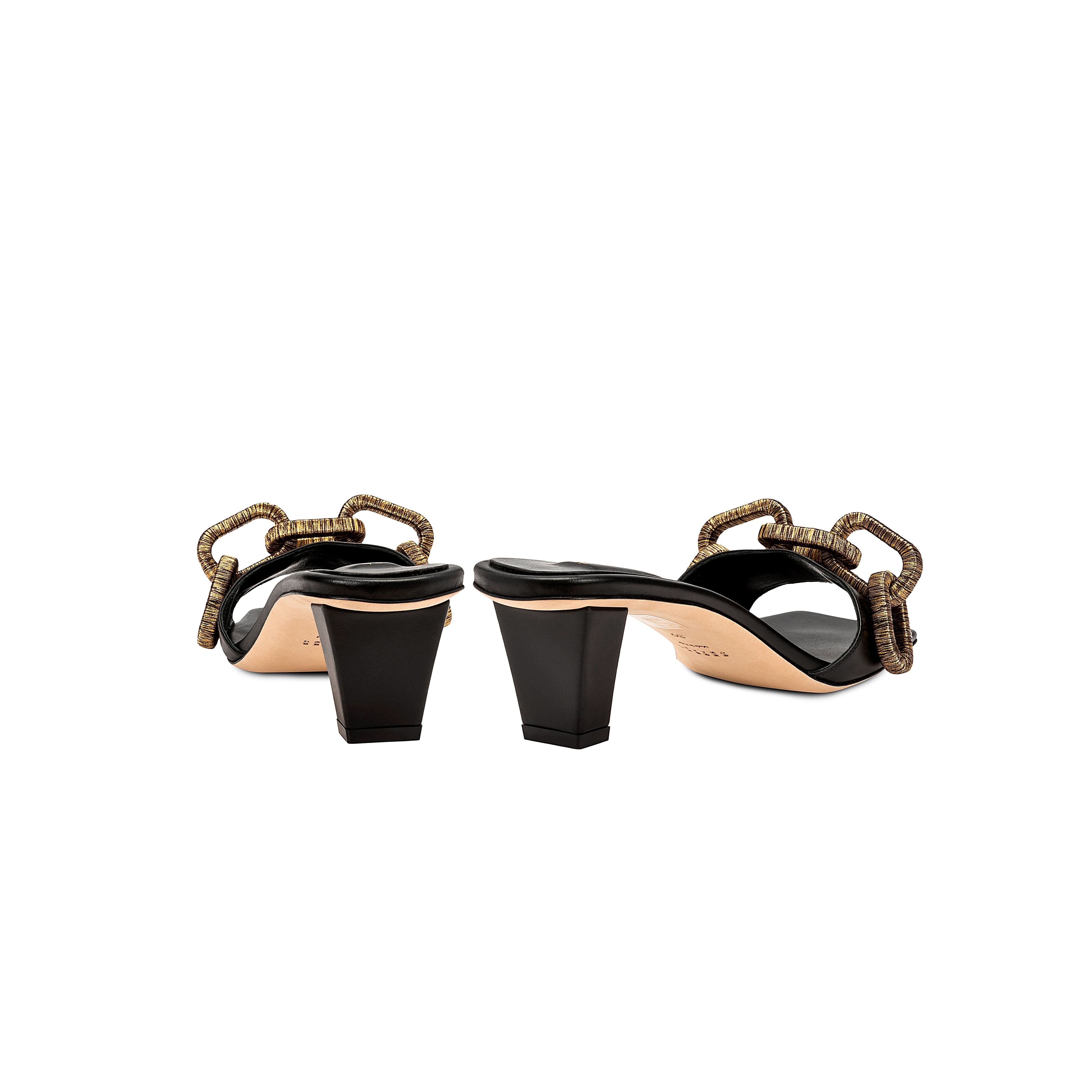Catena Black Mid-Heel Sandal featuring antique gold chain link design, elegant footwear for refined style.