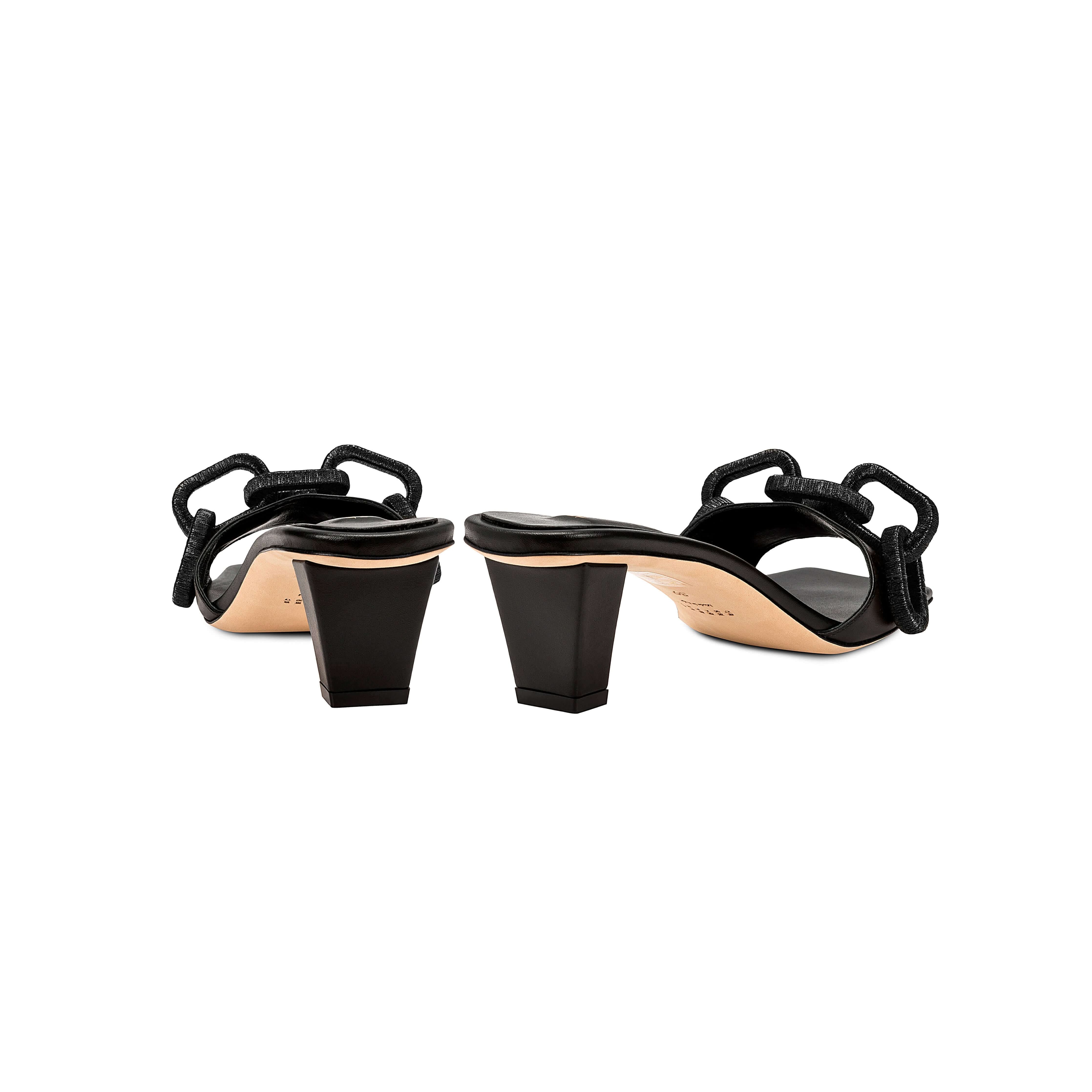 Back view of Catena Black Mid-Heel Sandal showcasing its elegant chain link design and sturdy block heel.