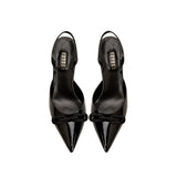 Catena Black Mid-Heel Slingback Pump with glossy patent leather, pointed toe, and chic bowed detail.