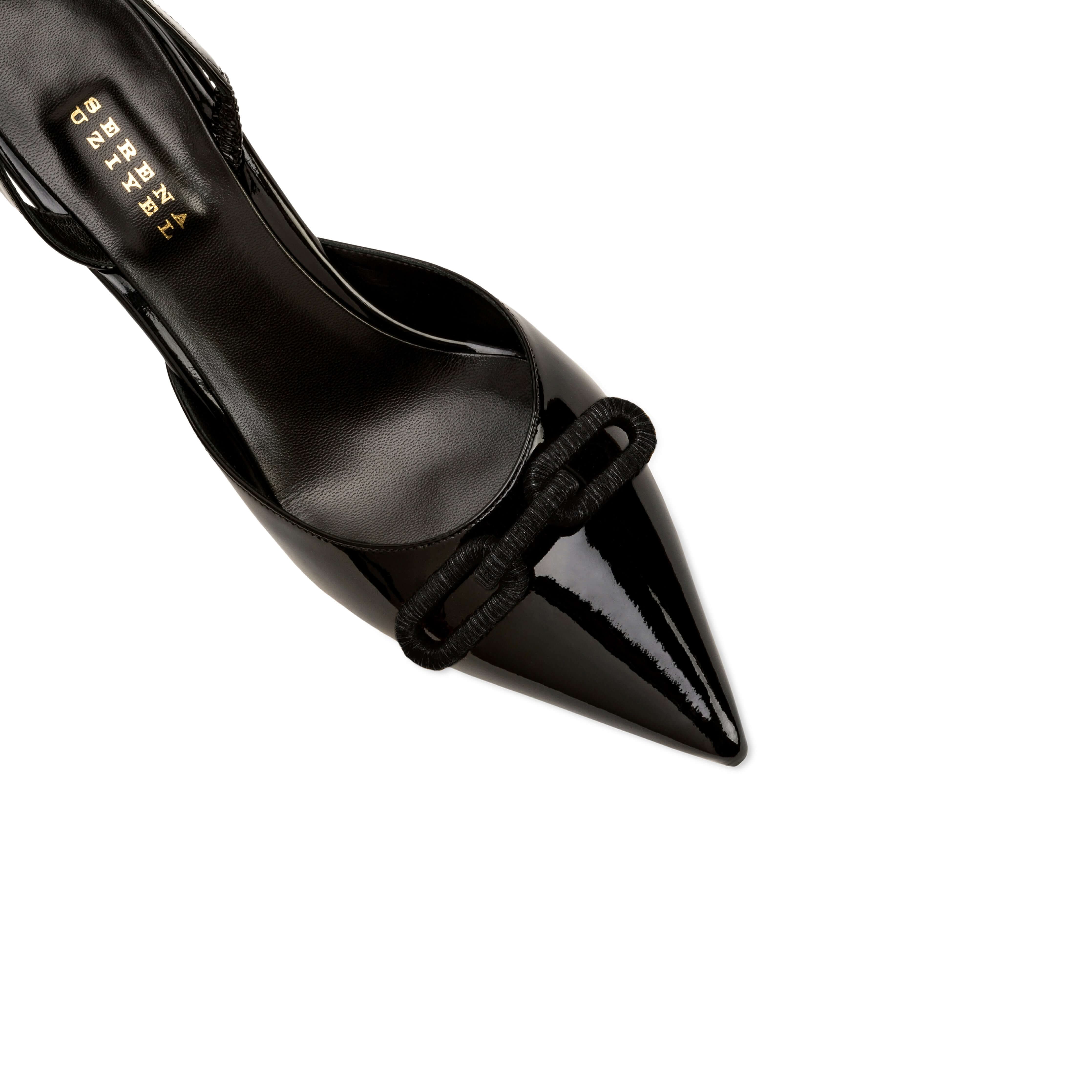 Catena Black Mid-Heel Slingback Pump featuring a glossy finish, pointed toe, and signature chain link detail.