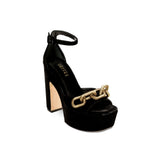 Catena Black Platform Ankle Sandal in velvet with metallic chain embellishments, featuring a block heel and ankle strap.
