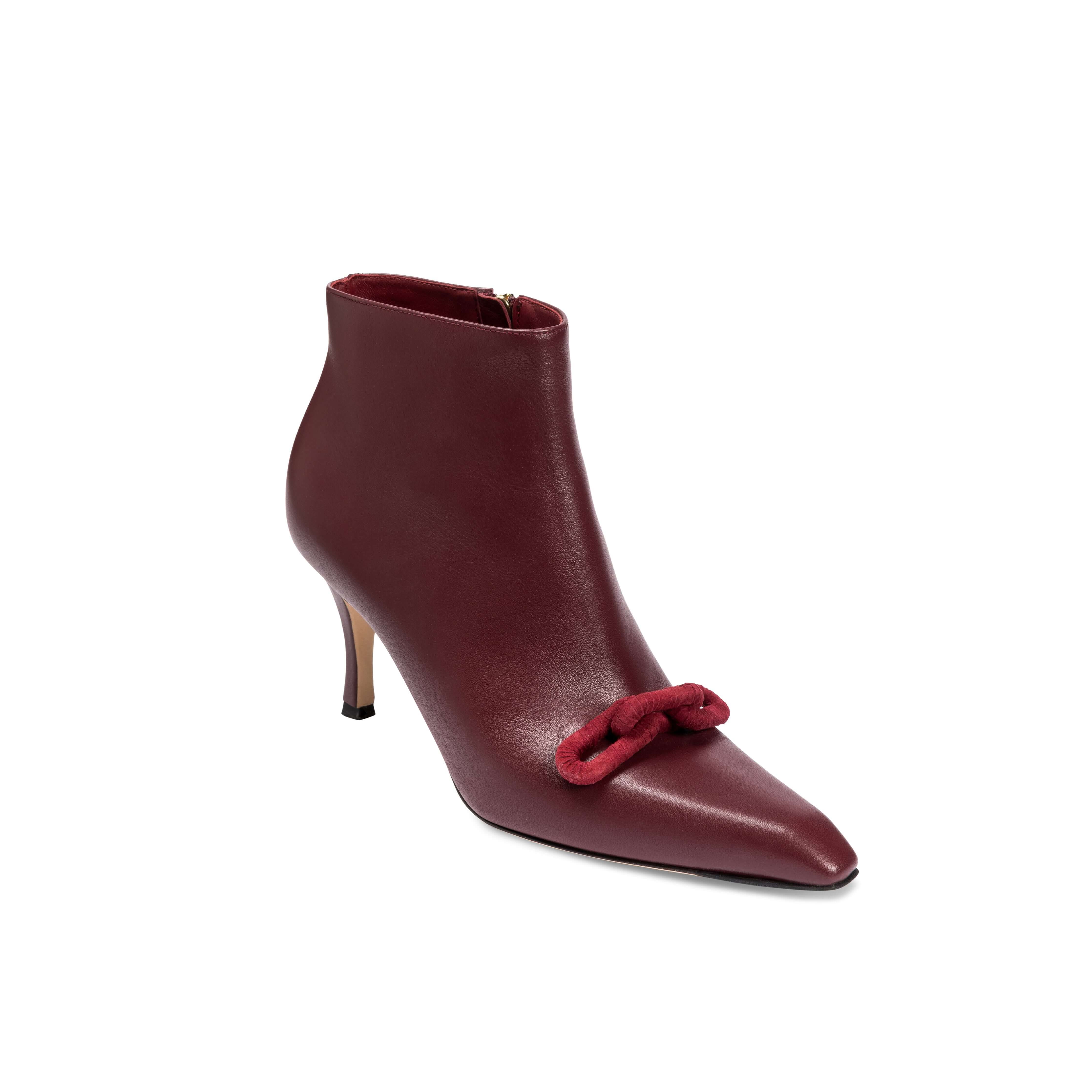 Catena Burgundy High-Heel Ankle Boot, made from smooth leather with pointed toe and signature chain link detail.