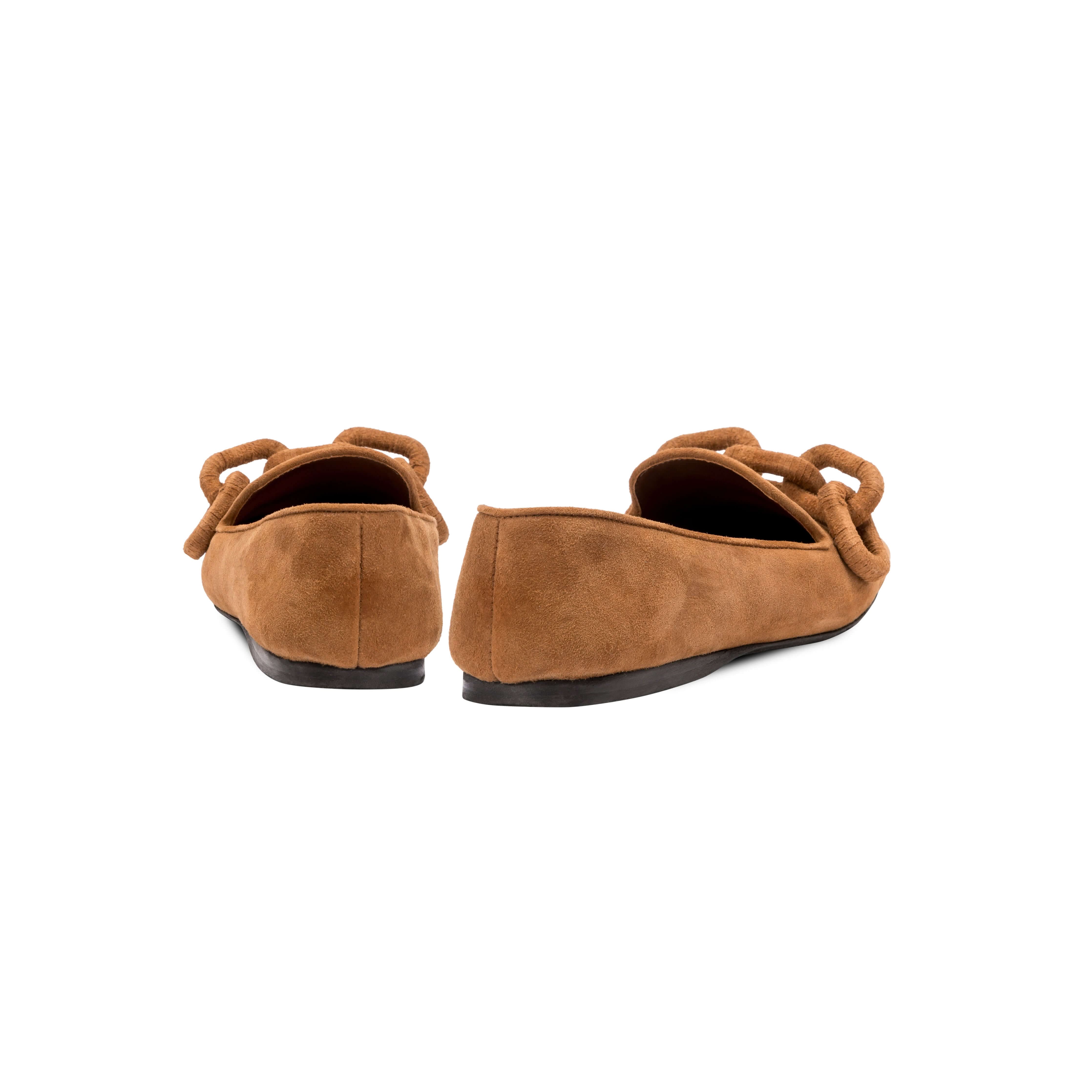 Back view of the Catena Camello Flat Moccasin in soft suede, showcasing wrapped suede chain link adornment.