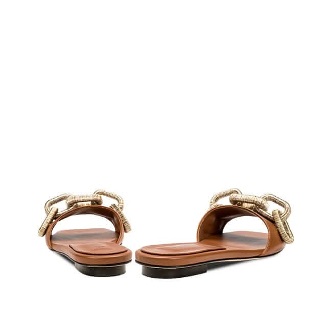 Catena Camello Flat Sandal in camel leather featuring antique gold and silver chain embroidery, offering comfort and style.