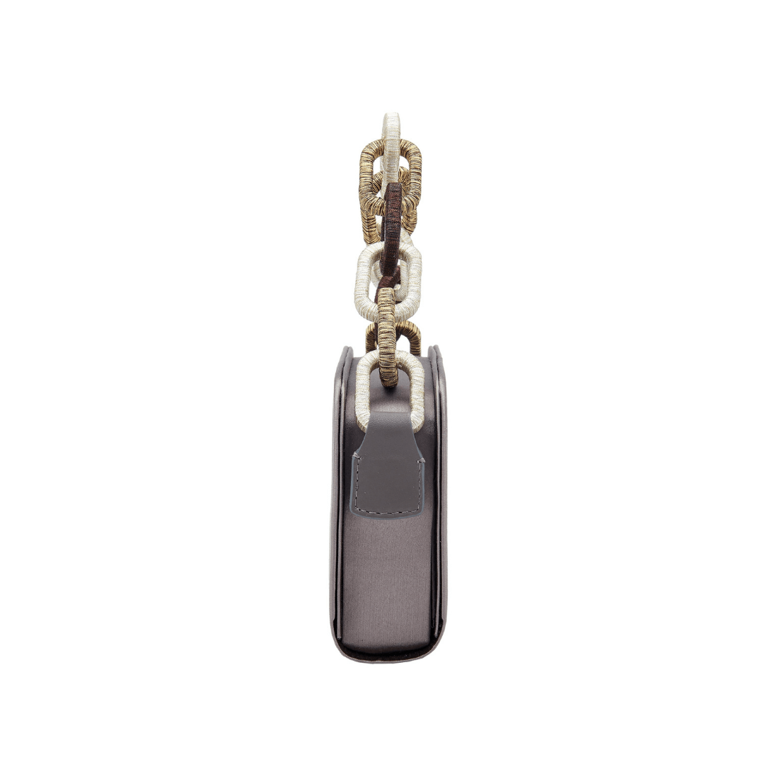 Elegant Catena Electrum Two-Sided Bag in luxurious silk satin with chain-link handle, showcasing its unique design.