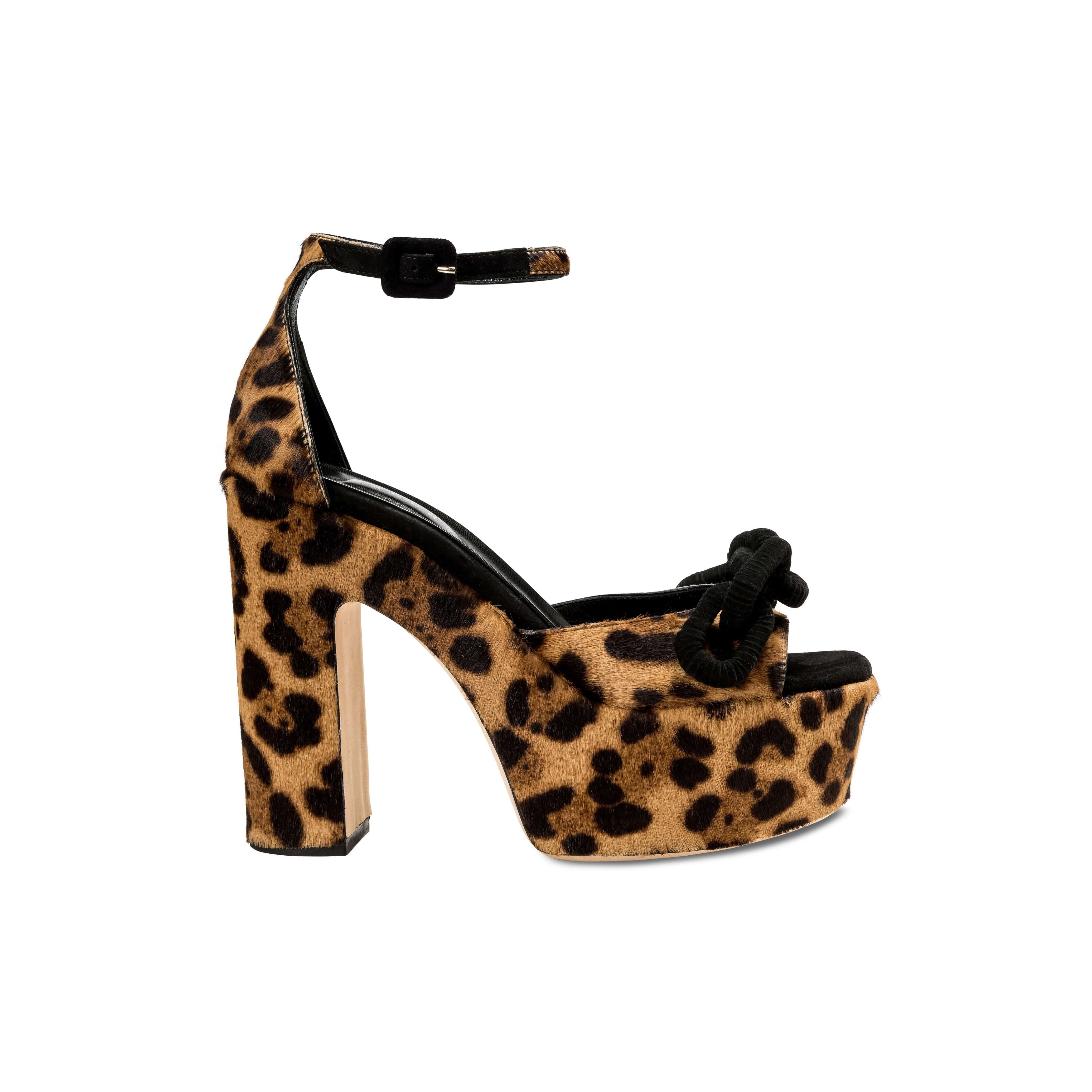 Catena Leopard Platform Ankle Sandal featuring a stylish leopard print and bold block heel for a fashion-forward look.