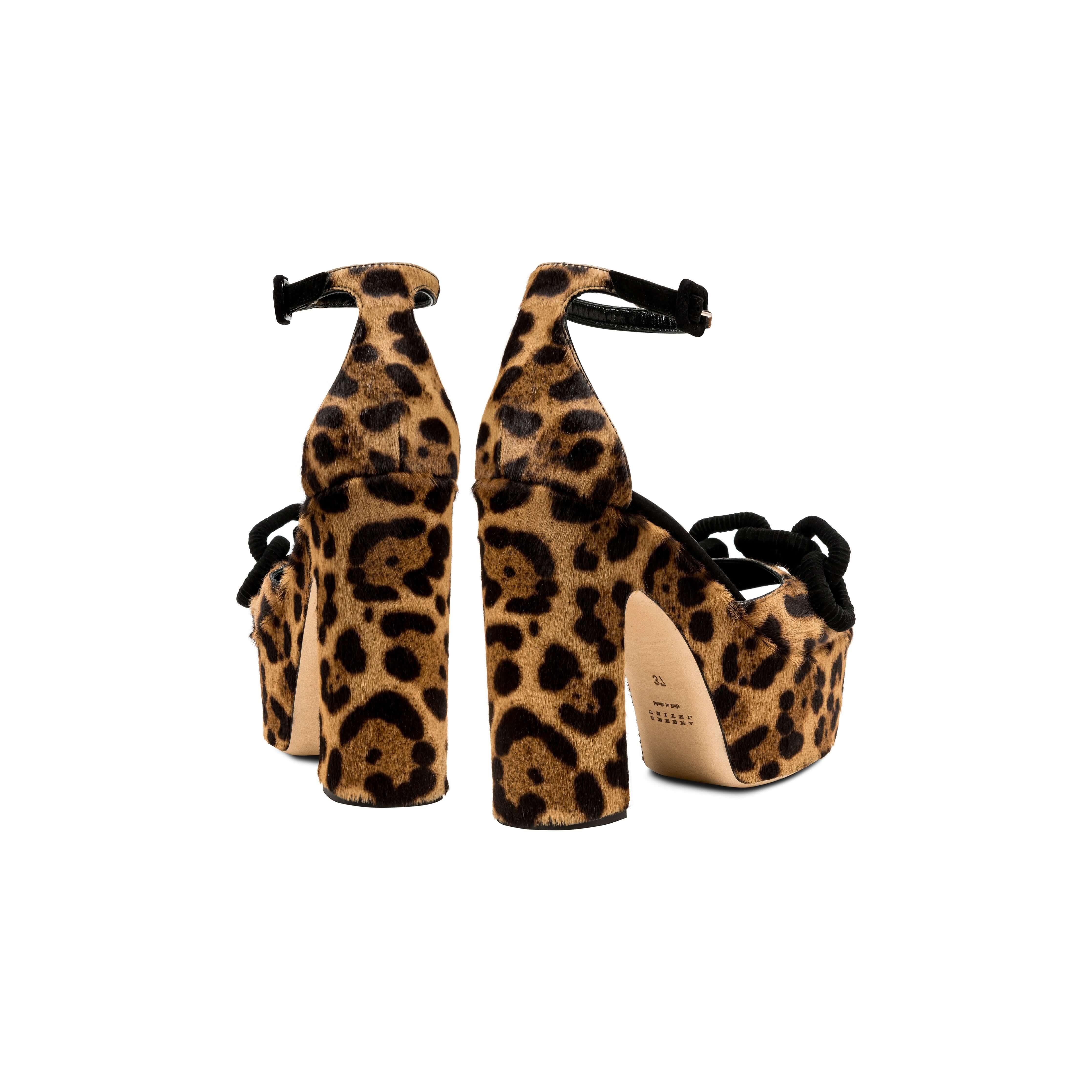 Catena Leopard Platform Ankle Sandal showcasing a stylish leopard print design with high block heels.