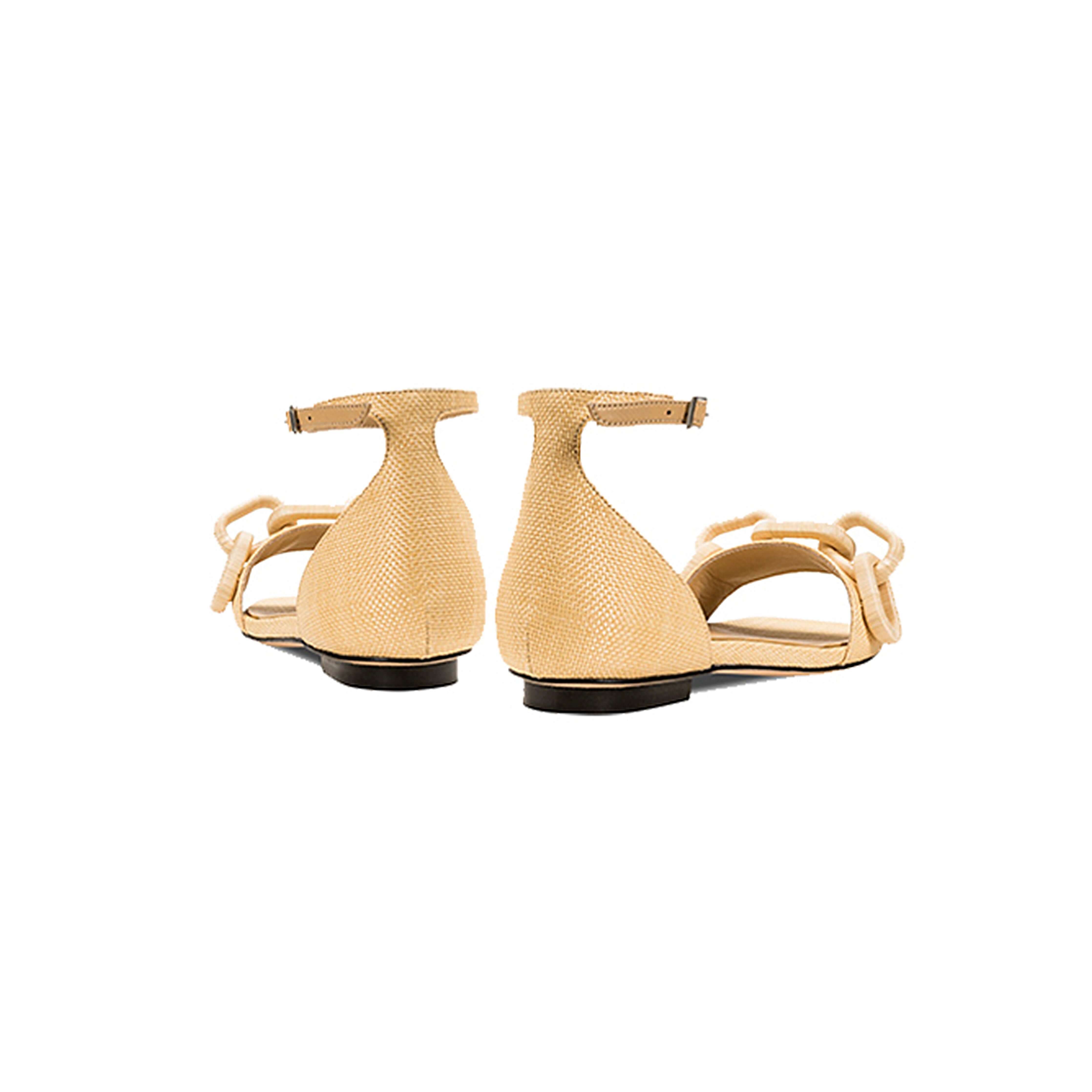 Back view of Catena Natural Flat Ankle Sandal showcasing the elegant design and natural raffia chain detail.