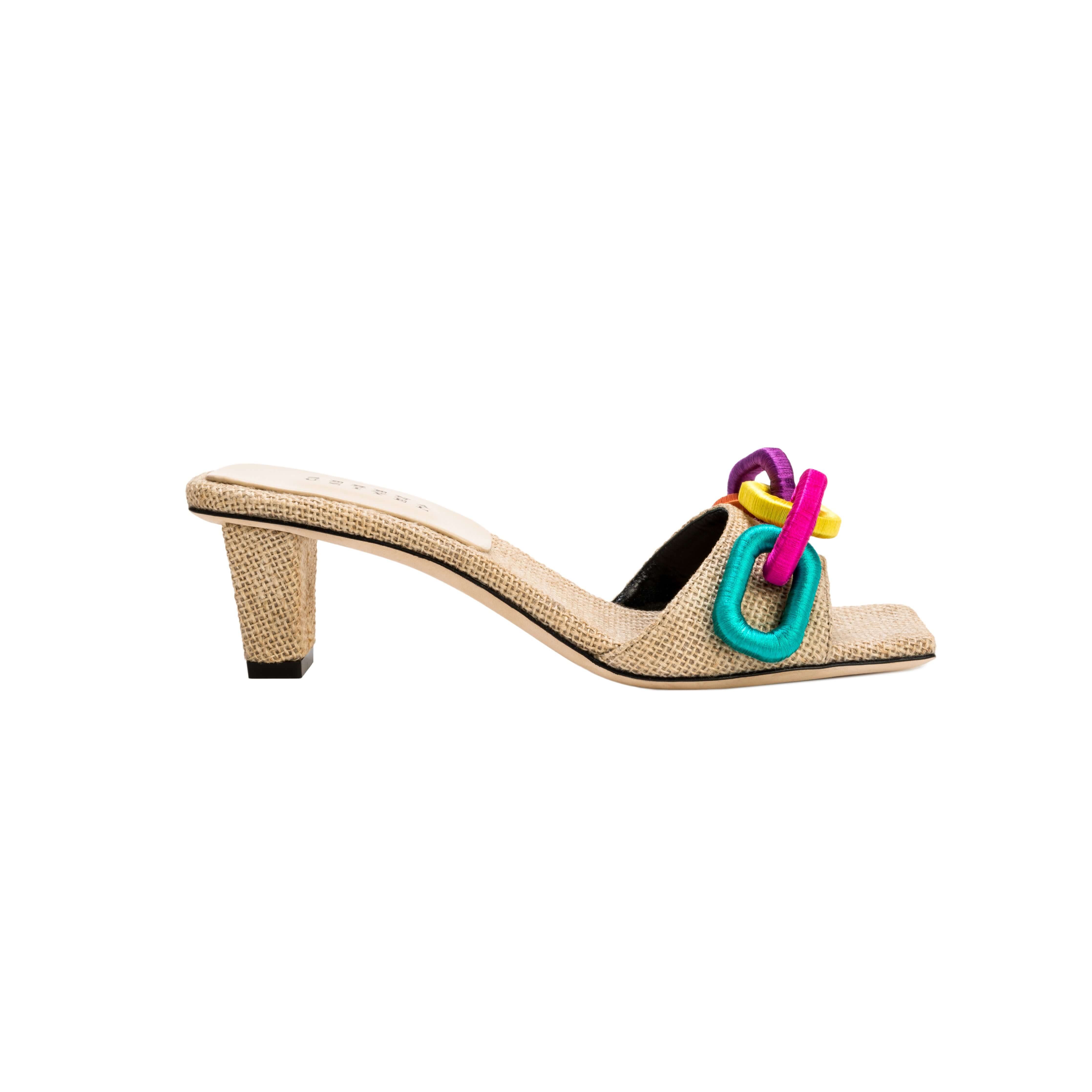 Stylish Catena Natural rainbow sandal featuring colorful decorative accents and a comfortable heel.