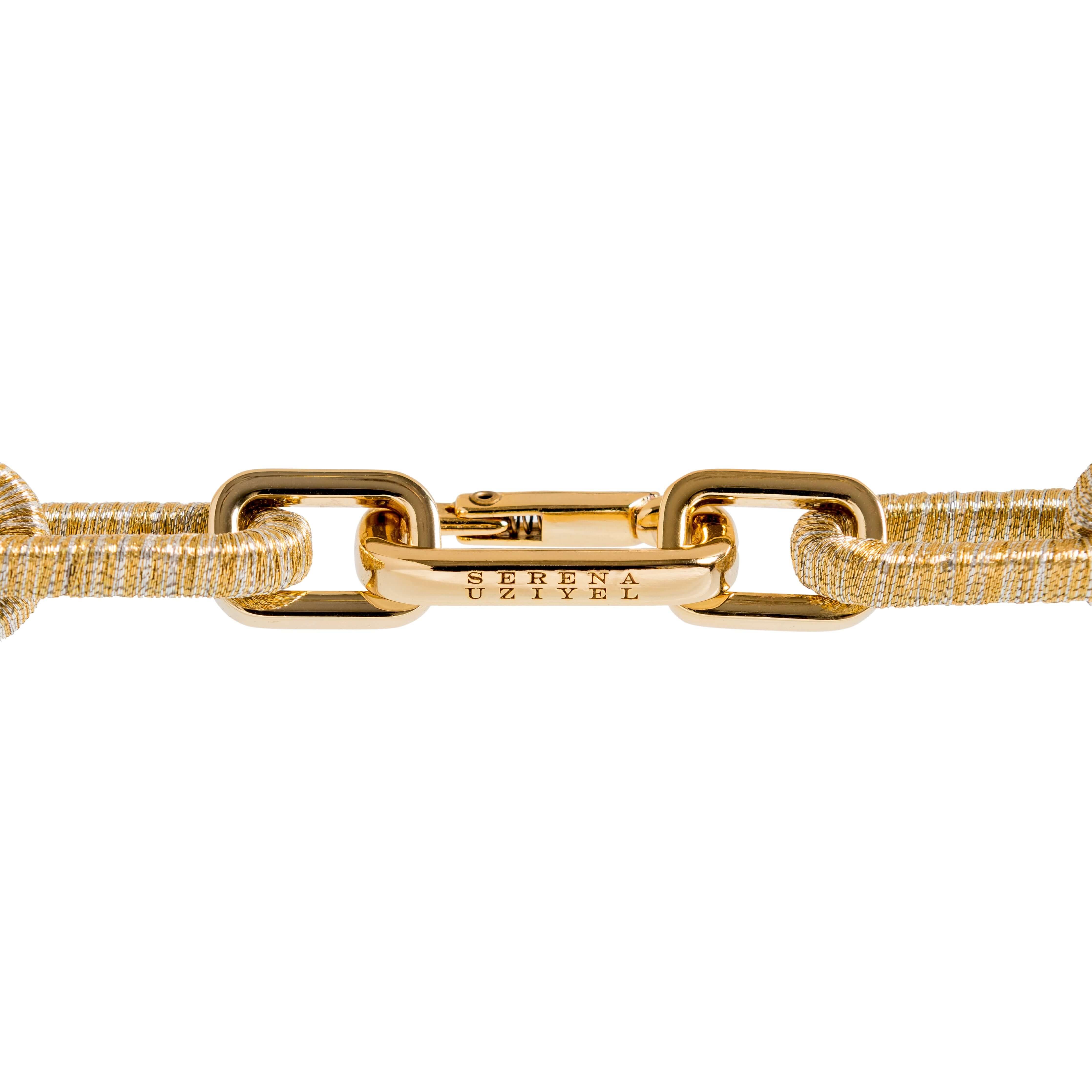 Close-up of Catena Rectangular Necklace featuring a gold chain and clasp by Serena Uyzbel.