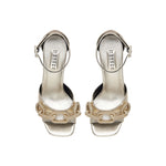 Catena Sahara Platform Ankle Sandal in shimmering gold leather with ankle strap and chain embellishments.