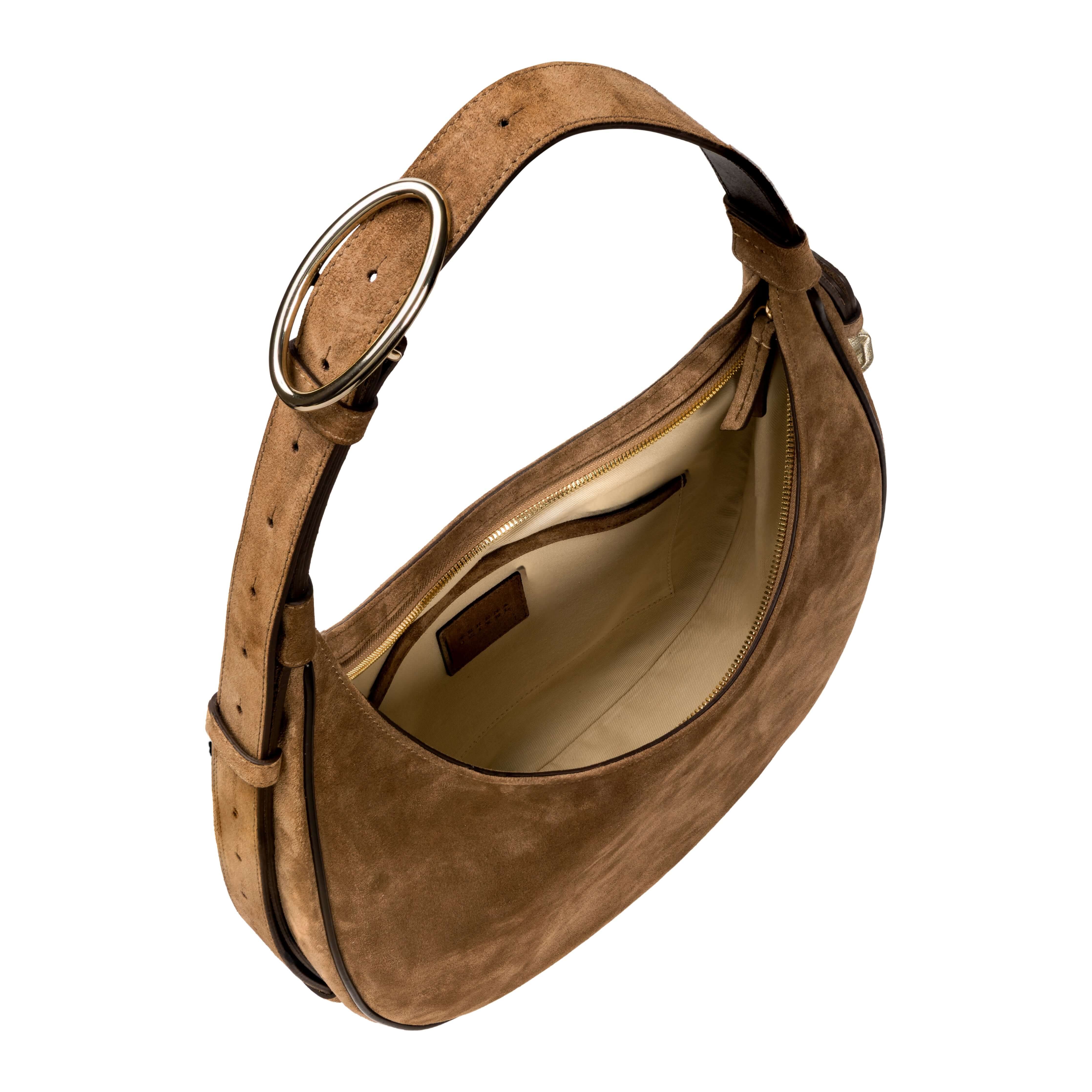 Interior view of the Catena Sand Hobo Bag, showcasing soft suede and adjustable strap detail.