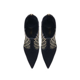 Elora Black High-Heel Ankle Boot featuring chic metallic detailing on suede caging for a sophisticated look.