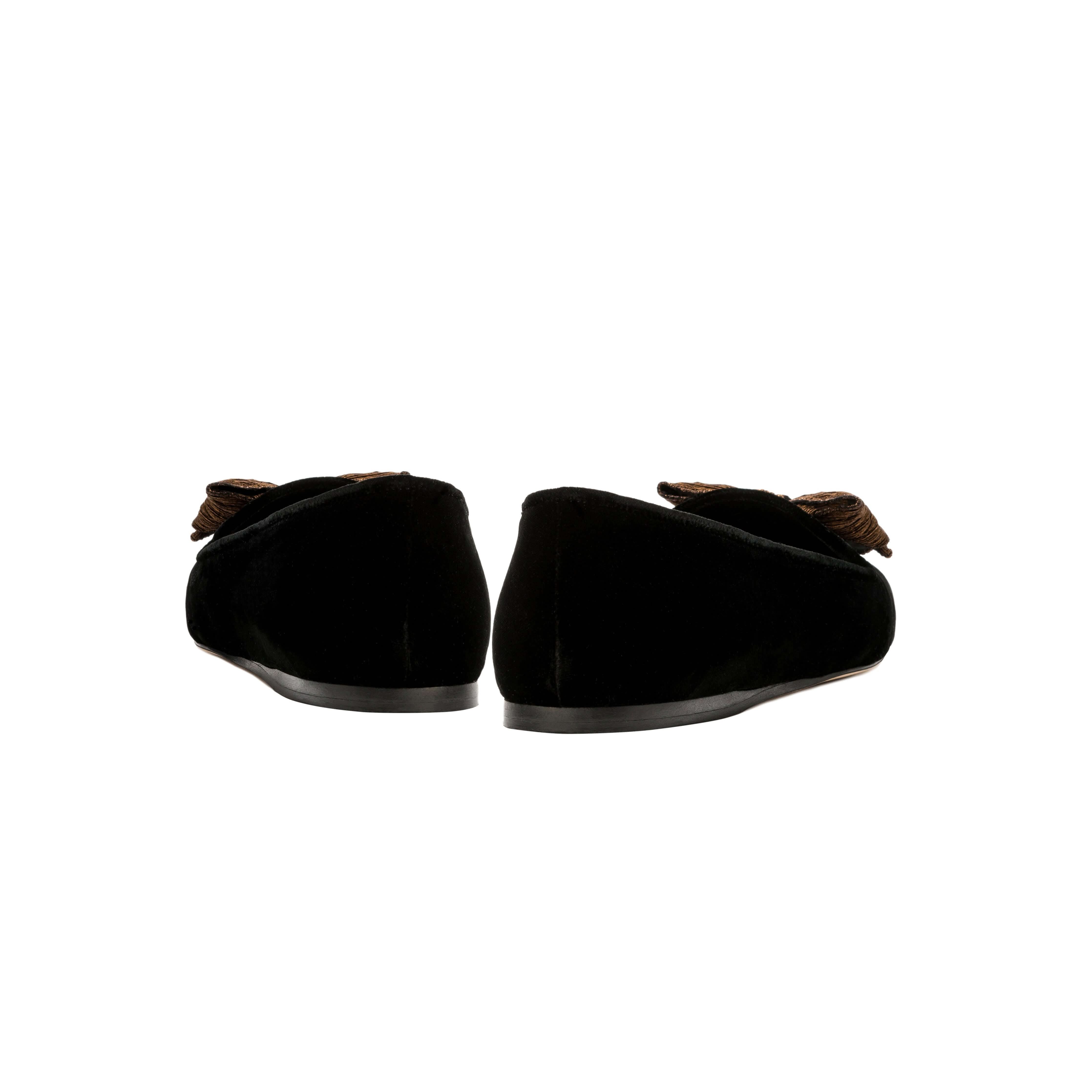 Fiocco Black Velvet Flat Moccasins featuring antique gold embroidered bow, showcasing luxurious craftsmanship and chic design.