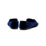 Back view of Fiocco Navy Flat Moccasins, showcasing luxurious navy velvet fabric and elegant bow detail.
