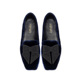Fiocco Navy Flat Moccasin featuring elegant black embroidered bow on luxurious navy velvet, perfect for chic fall style.