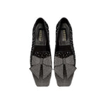 Fiocco Studs Flat Moccasin in black suede with crystal studs and a studded bow, ideal for chic winter styling.