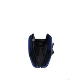 Fiocco Velvet Clutch in elegant dark blue velvet showcasing its structured boxy silhouette and interior.