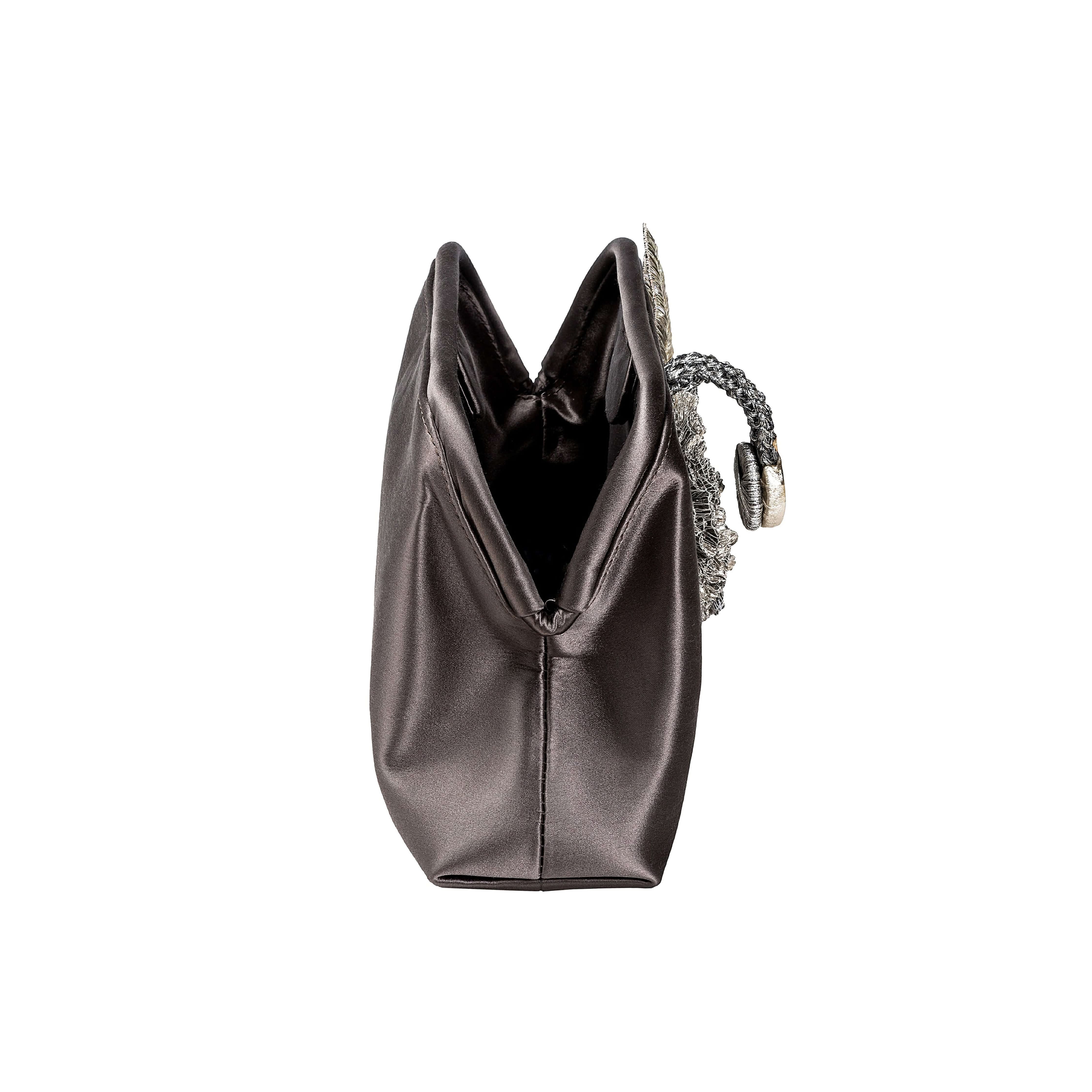 Fiora Electrum Pouch Bag showcasing elegant silver flower embellishment and luxurious satin texture.
