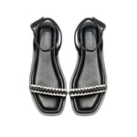 Kibele Black Ankle Cross Sandal featuring stylish braided strap design and an elegant silhouette for summer wear.