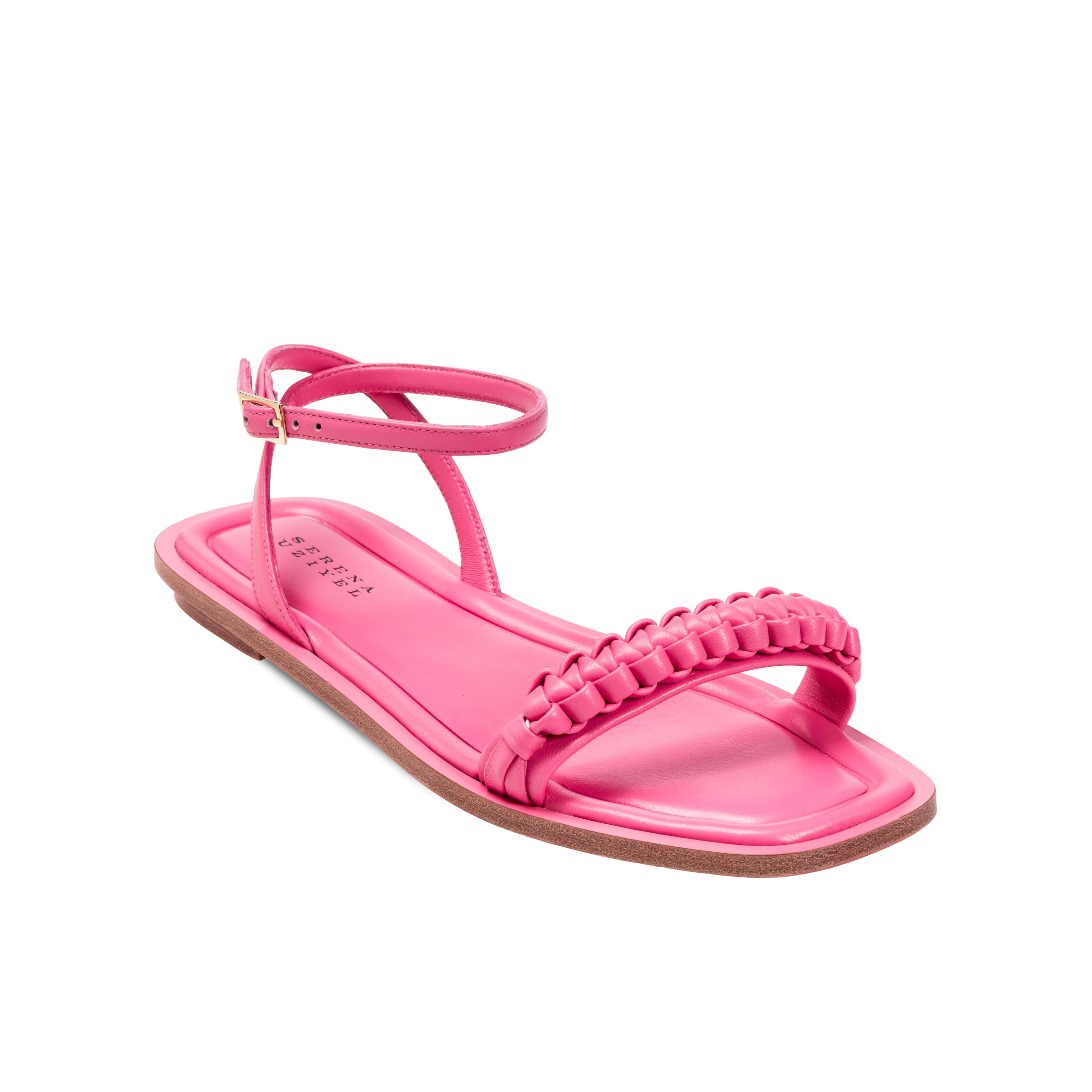 Kibele Bubble Pink Ankle Cross Sandal featuring a braided strap and flat sole, perfect for summer styling.