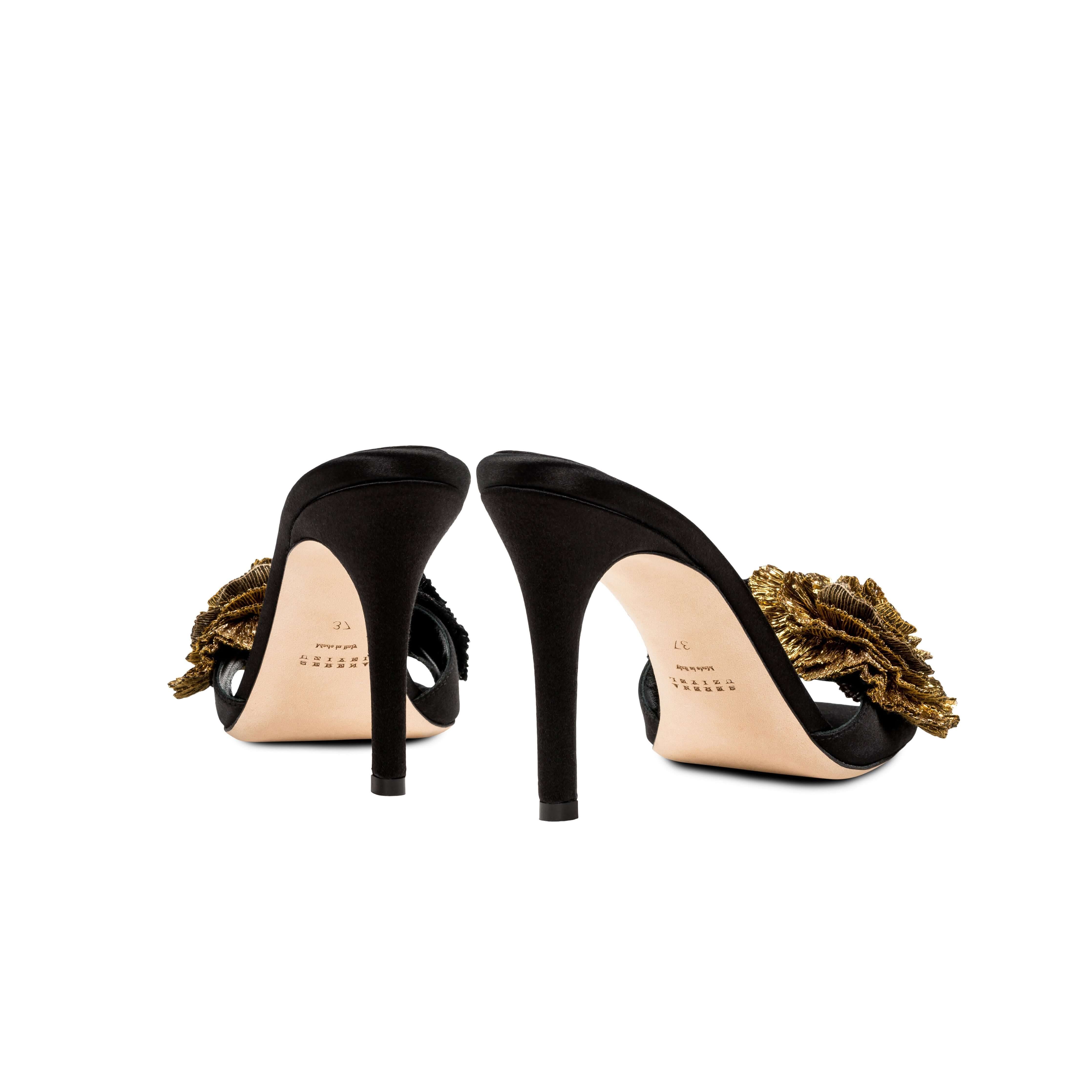 Elegant Lavinia Black High-Heel Sandal with Florette embellishment, showcasing fine craftsmanship and luxurious design.