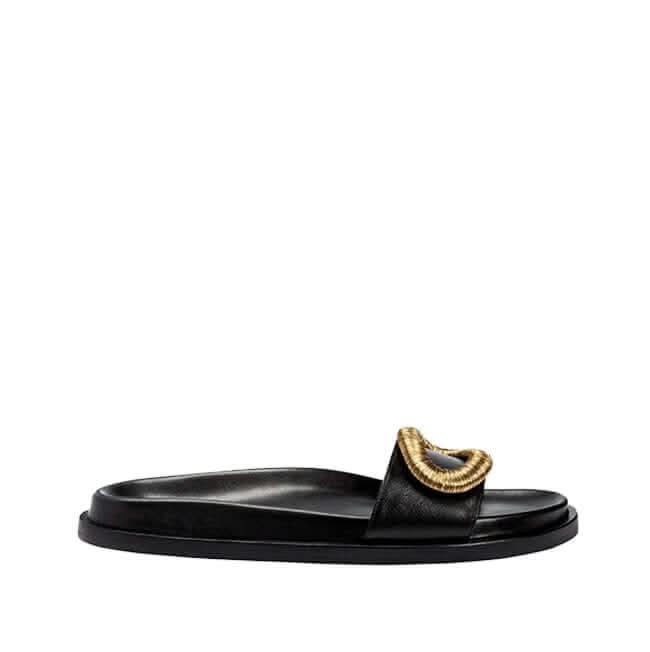 Naria Black Comfort Slide featuring a stylish gold accent, perfect for casual chic wear.