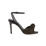 Rhea Black Ankle Cross Sandal featuring sleek black leather and elegant crochet detailing, crafted in Italy.