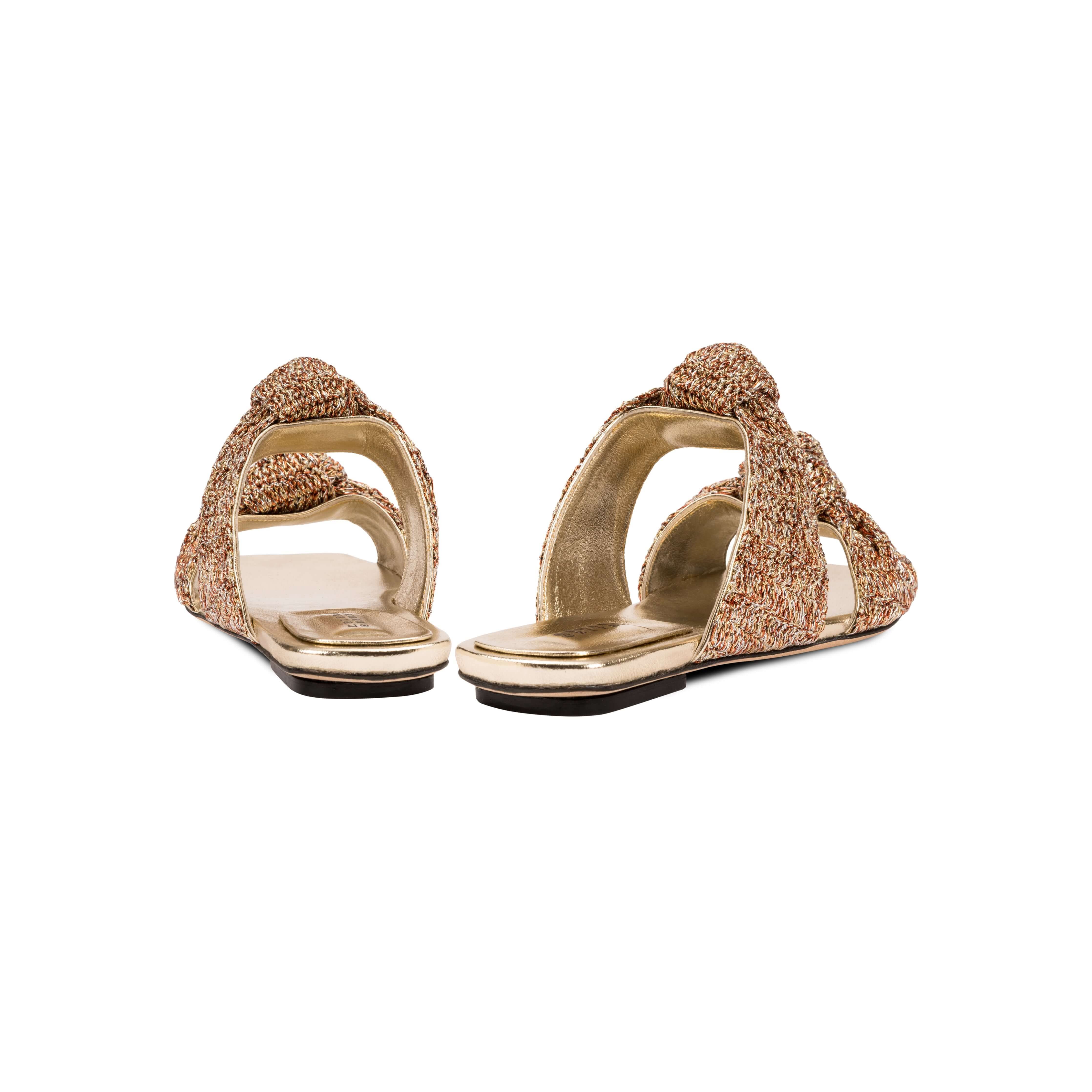 Back view of Rhea Sahara 2 Knot Sandal with metallic crochet leather straps and cushioned leather sole.