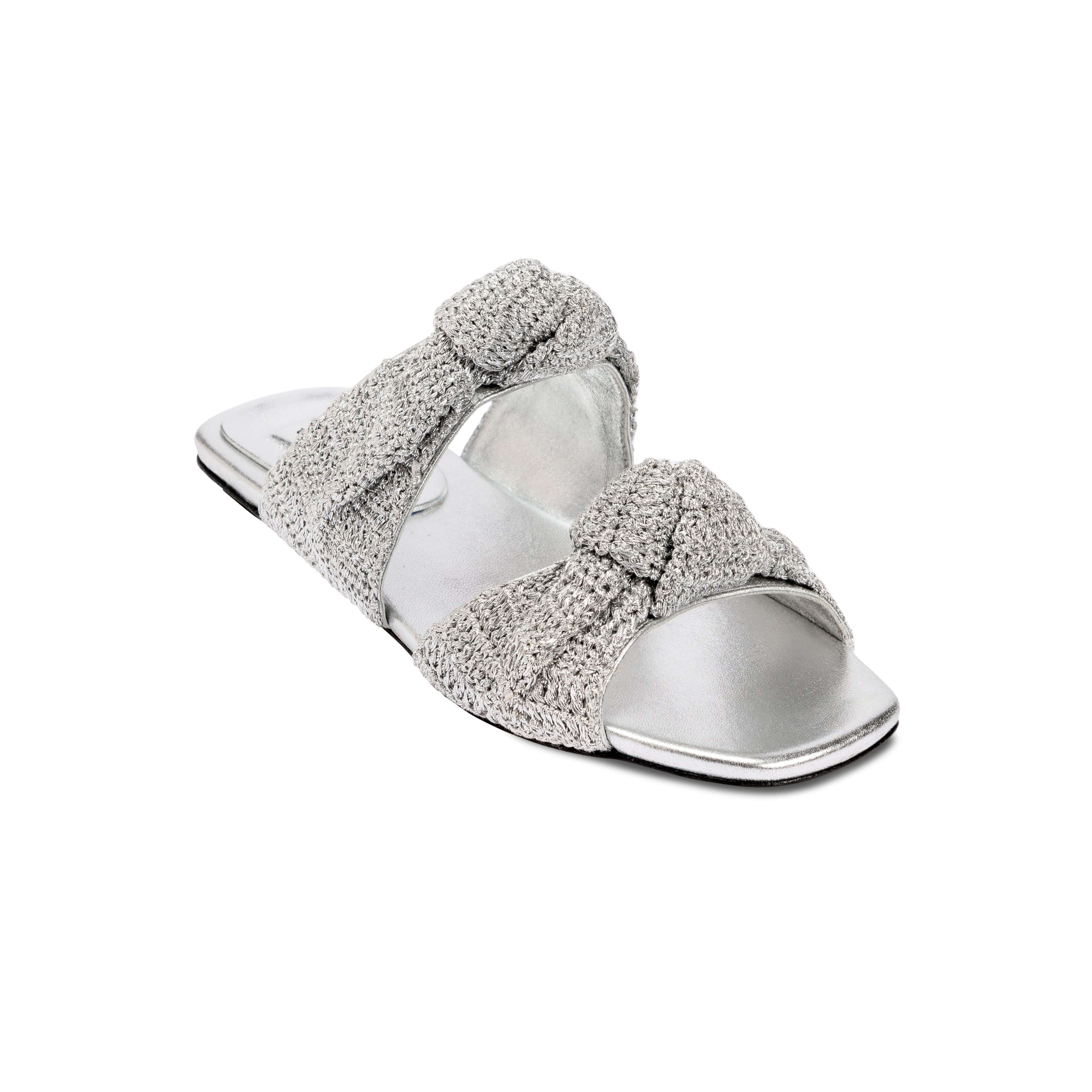 Rhea Silver 2 Knots Sandal featuring knotted crochet leather straps and cushioned insole, embodying elegance and craftsmanship.