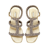 Ronda Gold Flat Gladiator Sandals with multi-colored woven metallic rope pattern, ideal for summer outings.