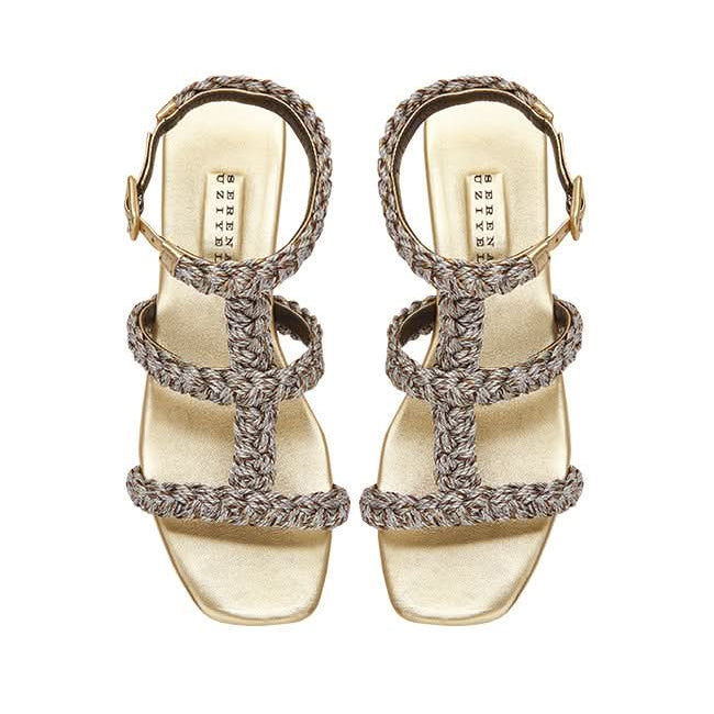 Ronda Gold Flat Gladiator Sandals with multi-colored woven metallic rope pattern, ideal for summer outings.