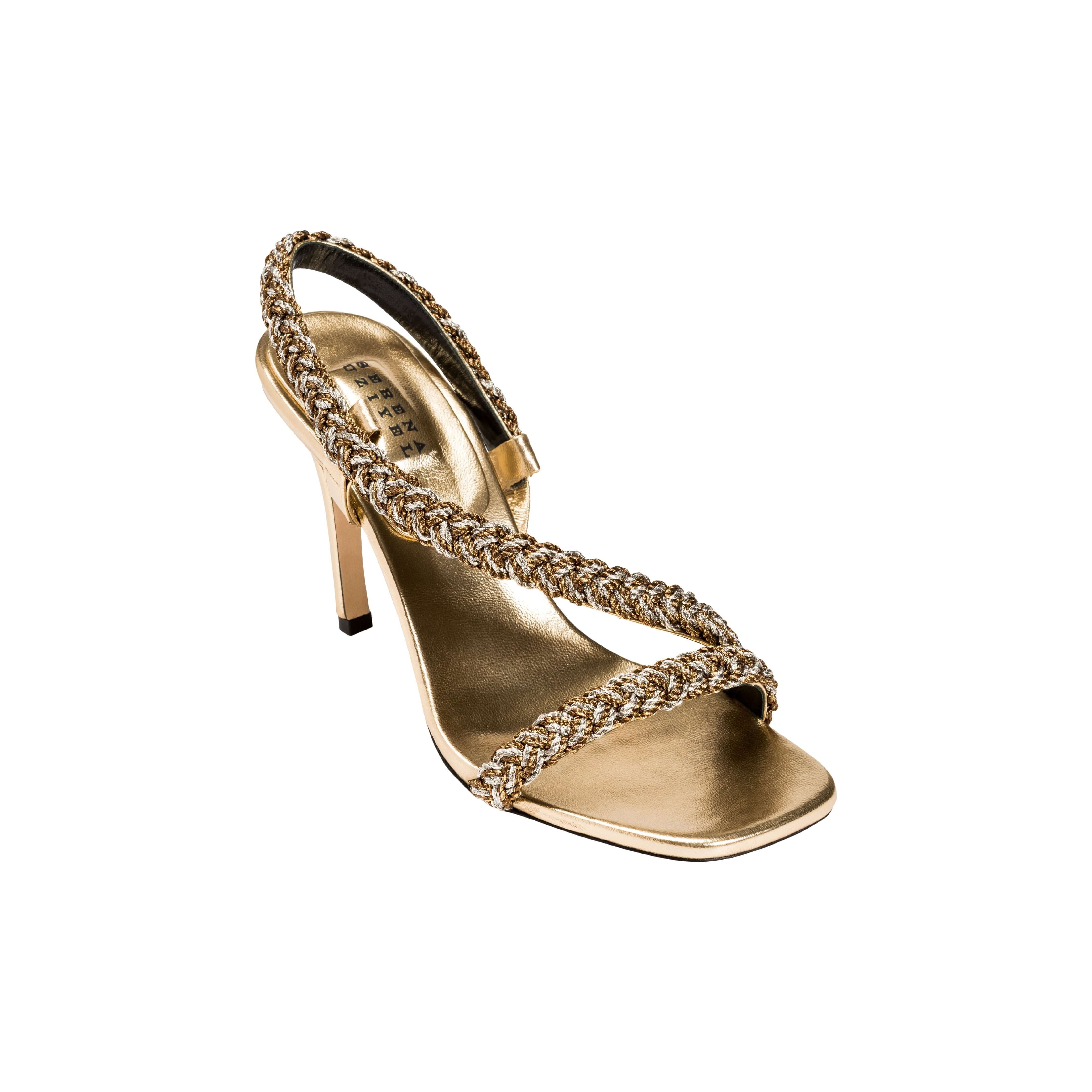 Ronda Gold High-Heel Asymmetric Sandal featuring elegant braided straps and sleek design perfect for any occasion.
