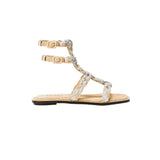 Ronda natural flat gladiator sandal with braided straps and buckle detailing, perfect for summer styles.